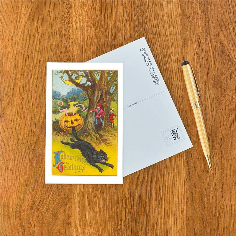 Found Image Press - Postcard HW-47 Halloween Greetings, Jack O'Lantern Biting Ca