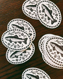 Flora West Design - Folk Art Trout Vinyl Sticker Hand Illustrated Outdoor Adventure Decal Colorado Trout Fish Fly Fishing Sticker Floral Fish 2.85” Oval