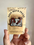 Shelley Couvillion - Book Wyrm (Dragon) - Book Worm Enamel Pin 