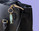 And Here We Are - Sardine Enamel Keychain & Bag Charm - Foodie, Seafood, Anchovy, Tinned Fish, Ocean, Fisherman - Stocking stuffer, Holiday, Gift Guide