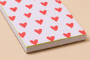 And Here We Are - Letterpress Small Spiral Notebook—Red Hearts (Cute, Love)