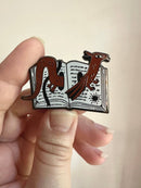 Shelley Couvillion - Book Wyrm (Dragon) - Book Worm Enamel Pin 