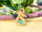 The Crowned Rabbit - Yellow Corn Snake Enamel Pin